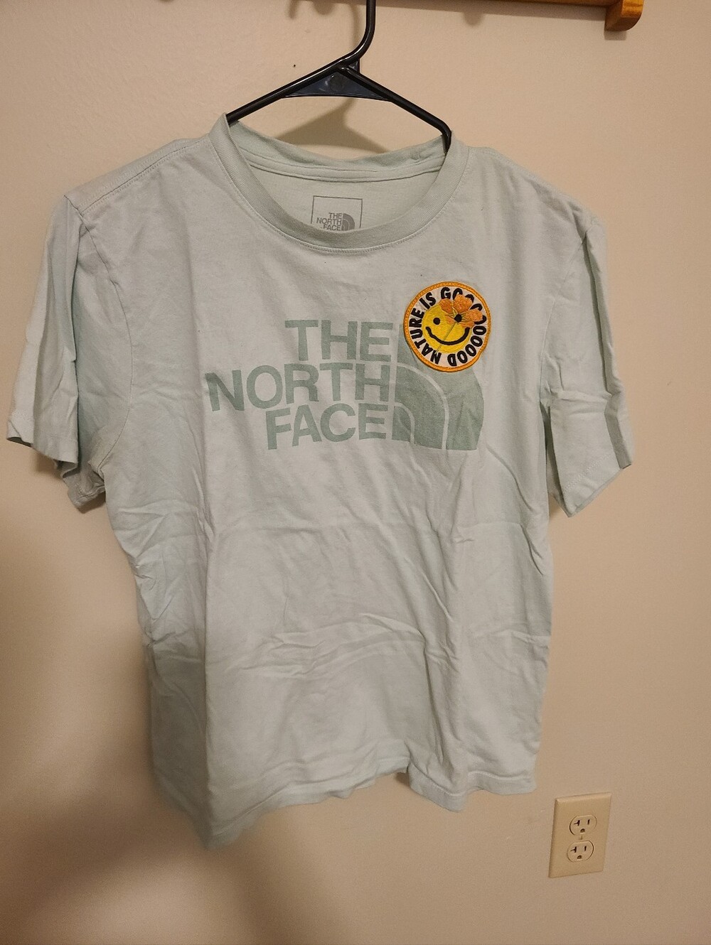 The North Face Mint Green Logo Tee with Yellow Smiley Patch